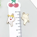 DIY Halloween charms featuring white cartoon ghost pendants with golden sun texture back - Halloween Striped Ghost (19541)