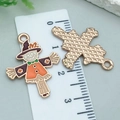 Enamel scarecrow pendant for jewelry making shown with ruler for size reference - Orange Enamel Thanksgiving Scarecrow (25231)