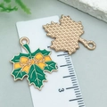 Green maple leaf enamel pendant with yellow bow and golden textured back detail - Green Enamel Thanksgiving Bow Maple Leaf (25232)