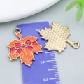 Pendentif feuille d'érable en alliage avec nœud rouge pour création de bijoux - 25*20mm / Feuille d'Érable Nœud Émaux Orange (25234)