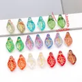 Makrodetail der bunten Glasblattanhänger mit goldenen Blattadern und 1mm Lochgröße - Blatt Set / 20 Stück/Packung / Mischfarbe Goldkontur