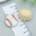Detailed view of white enamel baseball charms with gold trim and size ruler measurement - White Enamel Sports Softball