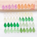 Macro shot of colorful glass leaf pendants with detailed veins and size 1.2x0.7cm - Transparent Multicolor