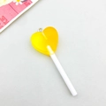 Close-up of yellow translucent heart lollipop resin pendant with metal loop for DIY jewelry - Orange Yellow Gradient Style (17097)