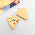 Close-up of a cute cartoon pizza resin pendant showing front detail and flat back side - Yellow Triangular Expression Pizza (17079)