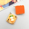 Detail showing Japanese style resin pendants with orange wave texture and metal ring - Orange Toast (17081)