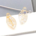 Pendentifs feuilles en verre irisé avec texture poudre d'or pour création bijoux DIY - Feuille / Champagne Transparent Couleur AB Tracé Or