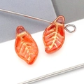 Transparenter orangefarbener Glasanhänger in Blattform mit goldener Aderung und Bohrung - Blatt / Transparent Orange Gelb Goldkontur