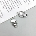 Detaillierte Vorder- und Rückansicht von Retro-Totenkopf-Anhängern aus Legierung für DIY - 10*16mm / Altsilber Totenkopf-Kopf Stil (10882)