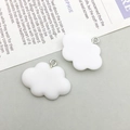 Detail of cloud-shaped resin charms with silver metal rings for DIY jewelry projects - White Resin Cloud (17108)