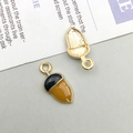Front and back view of cartoon acorn pendant showing gold plating and textured metal - Gold Pine Cone (9921)