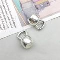 Detailed macro view of two vintage silver kettlebell charms for DIY jewelry making - Kettlebell (Antique Silver) 11x18mm (9010)