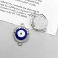 Detail of silver alloy evil eye charms with blue enamel and sparkling white rhinestones - Round Evil Eye (14560) / 17*12mm