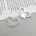 Detail of silver heart and butterfly jewelry connectors with white rhinestones - Heart Butterfly Style (14598) / 23x15mm