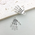 Vintage silver skeleton hand charms for DIY jewelry making with realistic bone texture - Antique Silver Skull Hand 12x16mm (16966)