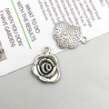 Pendentifs rose vintage en alliage argenté pour bijoux DIY montrant recto et verso - Fleur (12x16mm)