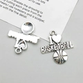 Detailed macro view of heart-shaped basketball charms in antique silver alloy finish - Antique Silver Letter Basketball (10676)