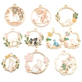 Golden alloy cat pendants with colorful enamel drips and hollow floral designs - Mixed Cat Styles (SN400)
