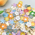 Macro view of assorted enamel flower alloy pendants for handmade DIY jewelry making - Random Mixed Enamel Flowers (SN487)
