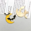 Detailed front and back view of a yellow enamel crescent moon and black bat charm - Black Moon Bat (15136)