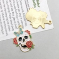 Detail of gothic skull pendant showing colorful enamel front and gold textured back - White KC Gold Enamel Halloween Floral Rose Skull (22x30mm-2.7g-18164)