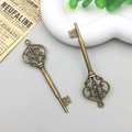 Vintage bronze alloy key pendant with an antique finish for DIY jewelry making - Decorative Key (8752) / 22x70mm