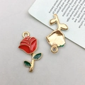 Detailed macro view showing the front and back of gold-plated rose flower enamel pendants - Red Enamel Rose Style (12306)