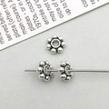 Retro silver flower spacer beads for DIY jewelry making with vintage oxidized finish - Antique Silver Round Spacer Bead (16351)