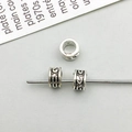 Three vintage silver alloy spacer beads with ethnic relief patterns for DIY jewelry - Antique Silver Round Spacer Bead (16357)