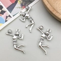 Macro shot of three antique silver alloy volleyball player pendants for jewelry making - Volleyball Girl Style (10674) / 25*30mm