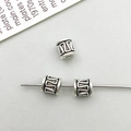 Three vintage silver cylinder spacer beads with geometric fretwork for DIY jewelry - Antique Silver Irregular Shape Spacer Bead (16344)