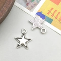 Close-up of star shaped antique silver alloy pendants with vertical brushed texture - Pentagram Star Style (9842)