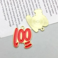 Detail view of red and gold alloy number 100 pendant with textured metal back - KC Gold Red 100 Score Style (16519)
