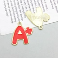 Macro detail of red enamel A+ grade alloy charm pendant with golden electroplated finish - KC Gold Red A Plus Grade Style (16520)