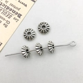 Dettaglio di perline distanziatrici in argento antico per creazione gioielli fai-da-te - Perlina Distanziatrice Rotonda Argento Antico 3*8mm (Foro 2.1mm)(16473)
