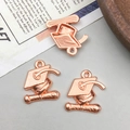 Three rose gold alloy graduation cap pendants with hanging loops for DIY jewelry making - Rose Gold