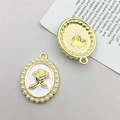 Oval heart pendant with rose relief and white pearl border in gold finish - KC Gold White Base Rose (15896)