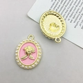 Pink enamel oval pendant with golden rose relief and faux pearl border - KC Gold Pink Base Rose (15900)