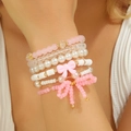 Pink beaded bracelet set with sweet butterfly charms and pearls for women's wrist - Summer Vacation Woven Style (ZJ14937)
