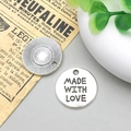 Ciondoli rotondi in lega argento antico 'MADE WITH LOVE' per creazione gioielli - Stile Made With Love (8996)