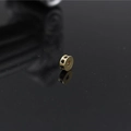 Macro view of a gold plated spacer bead with black zircon inlay for DIY jewelry - Gold Black Zirconia