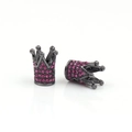Macro view of crown beads in gunmetal finish with magenta rhinestones for DIY jewelry - Gunmetal Black With Fuchsia Zirconia