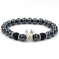 Detailed shot of crown beaded bracelet with hematite beads and lava stones - Zirconia Crown / Crown Silver