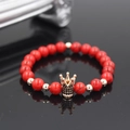 Red stone beaded bracelet featuring a rose gold crown charm set with black stones - Red Style (ZJ1390RG)