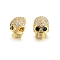 Perles tête de mort dorées avec zircons blancs et yeux noirs, vues de face et de profil - Or avec Œil Noir