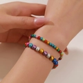 Set di 7 braccialetti bohémien colorati con perline multicolore per donna - Sovrapposizione Texture Metallica Multicolore (ZJ14278)