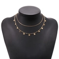 Collier double couche doré avec œil de protection et papillon sur un support noir - Style Or Double Plusieurs Petits Papillons (ZJ2672)