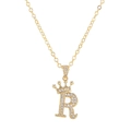 Detailed shot of golden crown letter R pendant with sparkling zircon micro-paving - Letter R / Gold