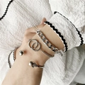 Silver punk jewelry set featuring thick chain bracelet and carved skull cuff bangle - Silver Style (ZJ4004)