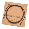 Detail view of handmade Morse code bracelet with hematite beads on a kraft card - Beautiful Badass (ZJ5548)
